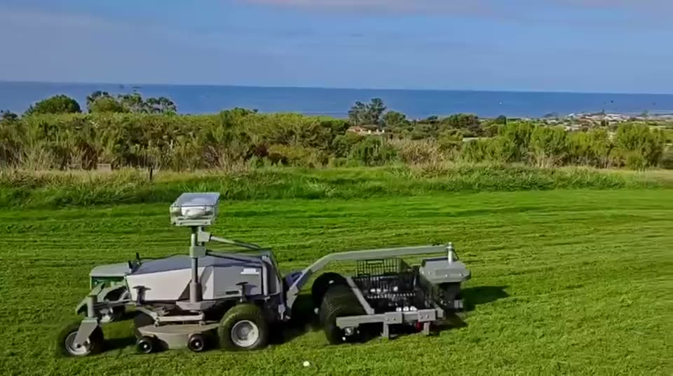 Autonomous mower with front ball picker